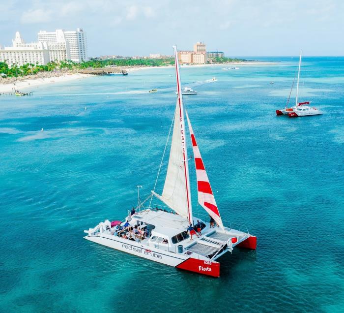 Catamaran of Red Sail Sports Aruba: Sailing and Snorkeling