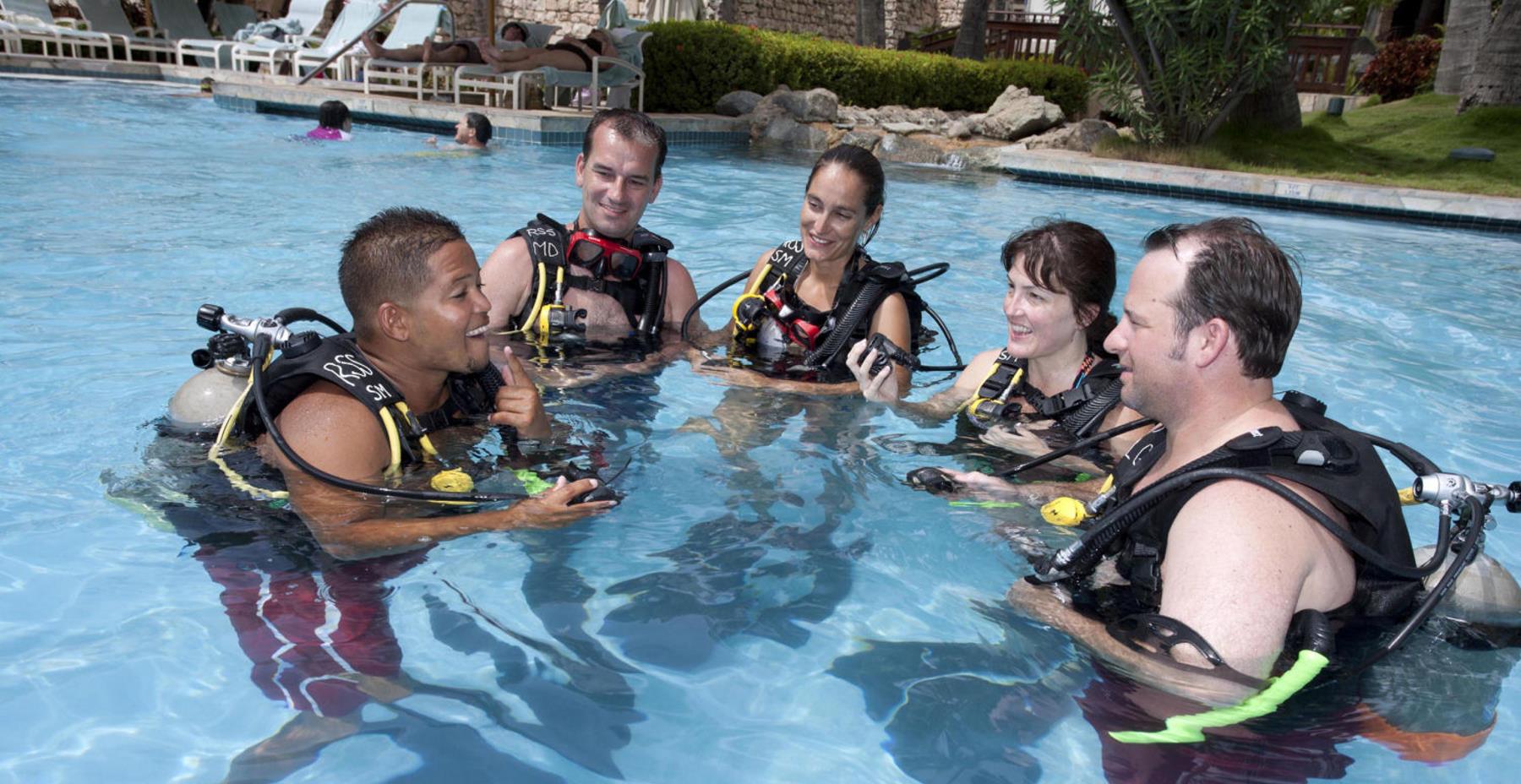 PADI Dive Courses - Learning in a swimming pool